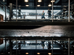 Undisputed Boxing Gym window image with two people training in boxing ring.